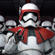 A new stormtrooper named Lt. Gauge has armor with red highlights and points his finger at the viewer while regular troopers are lined up behind him.